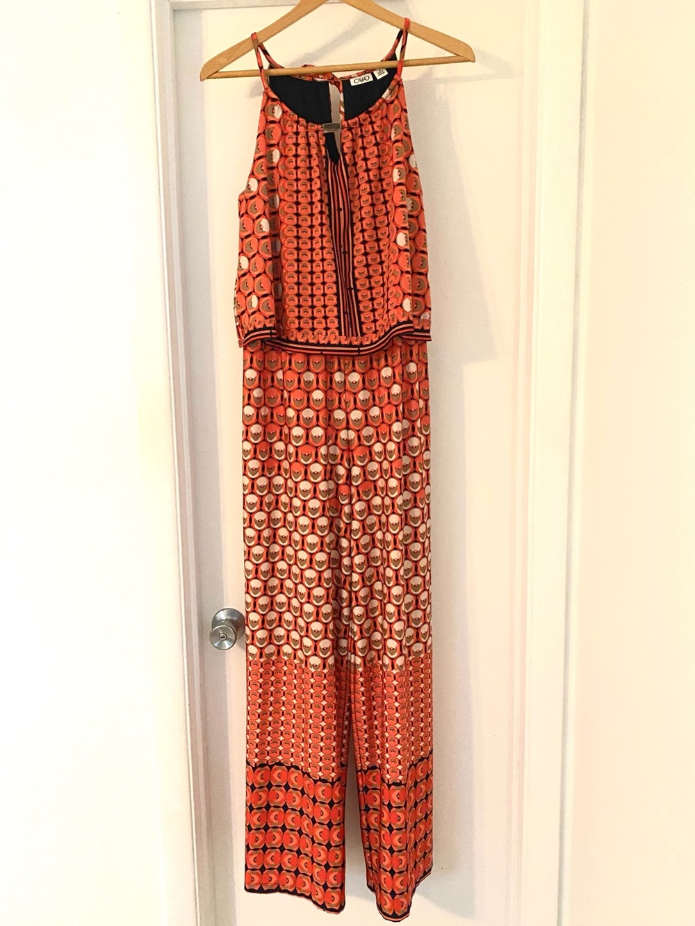 CATO Orange Black Printed Sleeveless jumpsuit. Size medium.